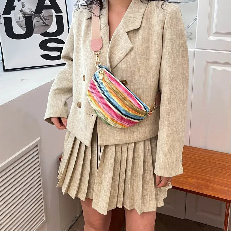 Women's woven straw beach bag in bohemian style, available in pink or blue colour with single shoulder strap