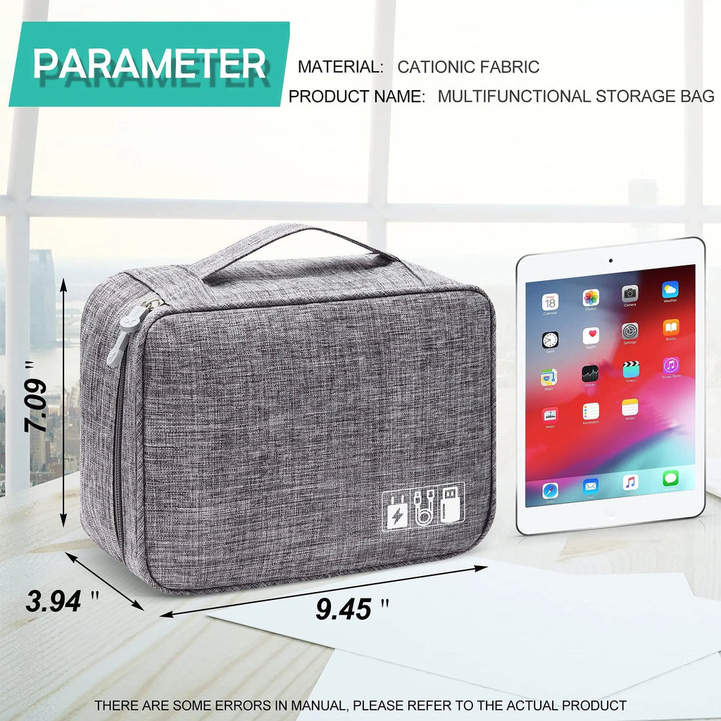 Black waterproof electronics organiser bag open, showing mesh pockets, elastic loops and removable dividers.