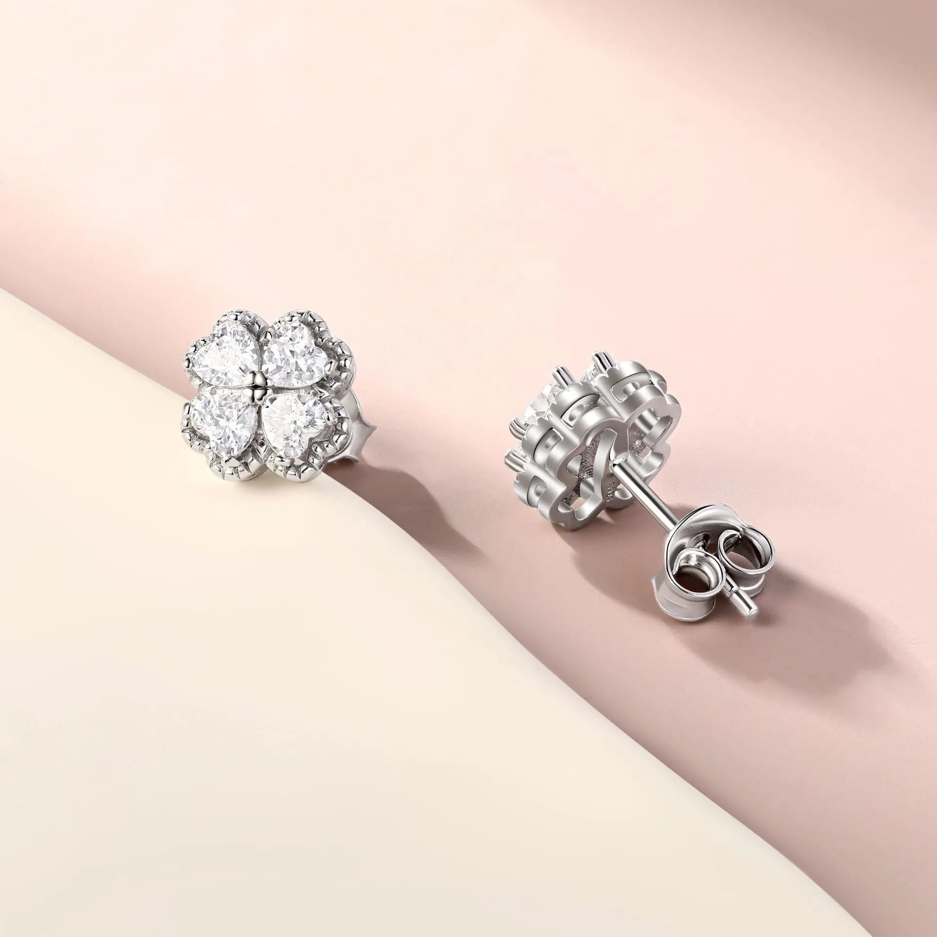 Zeng Yin 925 silver heart-shaped earrings with four-leaf clover design and zircon accents