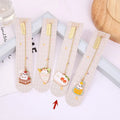 Metal bookmark with cartoon cat pendant in one of four designs measuring 3.8cm by 18.3cm