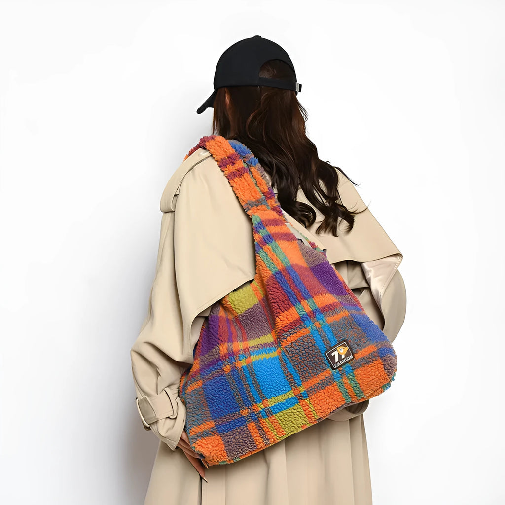 Women's plaid crossbody shoulder bag in soft plush fabric showing horizontal square shape and large capacity