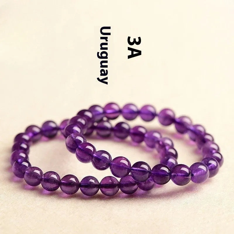 Natural amethyst bracelet with scattered Uruguay beads in selectable sizes and colour grades.