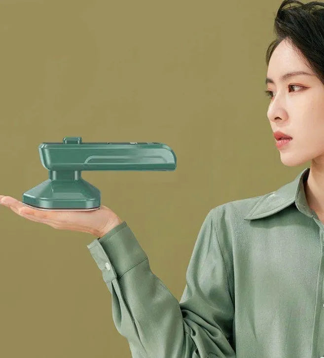 Dark green portable hanging ironing machine with ceramic panel and sharp corner design for travel use