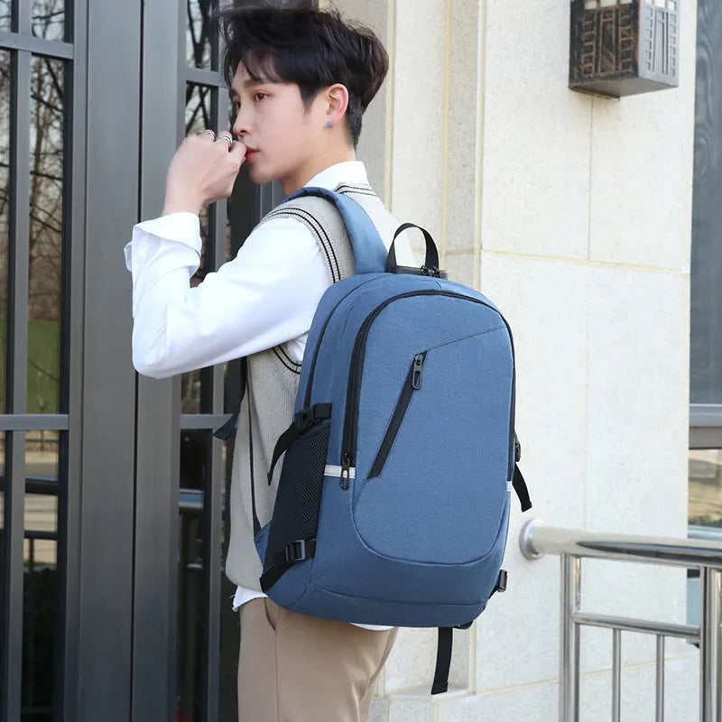 Grey Oxford cloth computer backpack with 35 litre capacity showing front compartment and shoulder straps