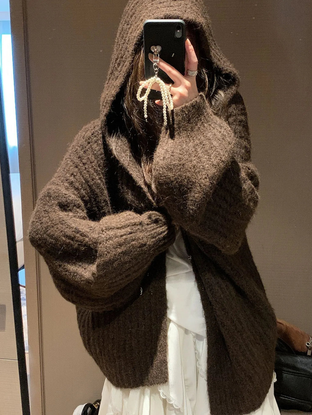 Women's loose fit hooded cardigan in thick acrylic fabric, shown in brown, dark grey, and milky white colour options