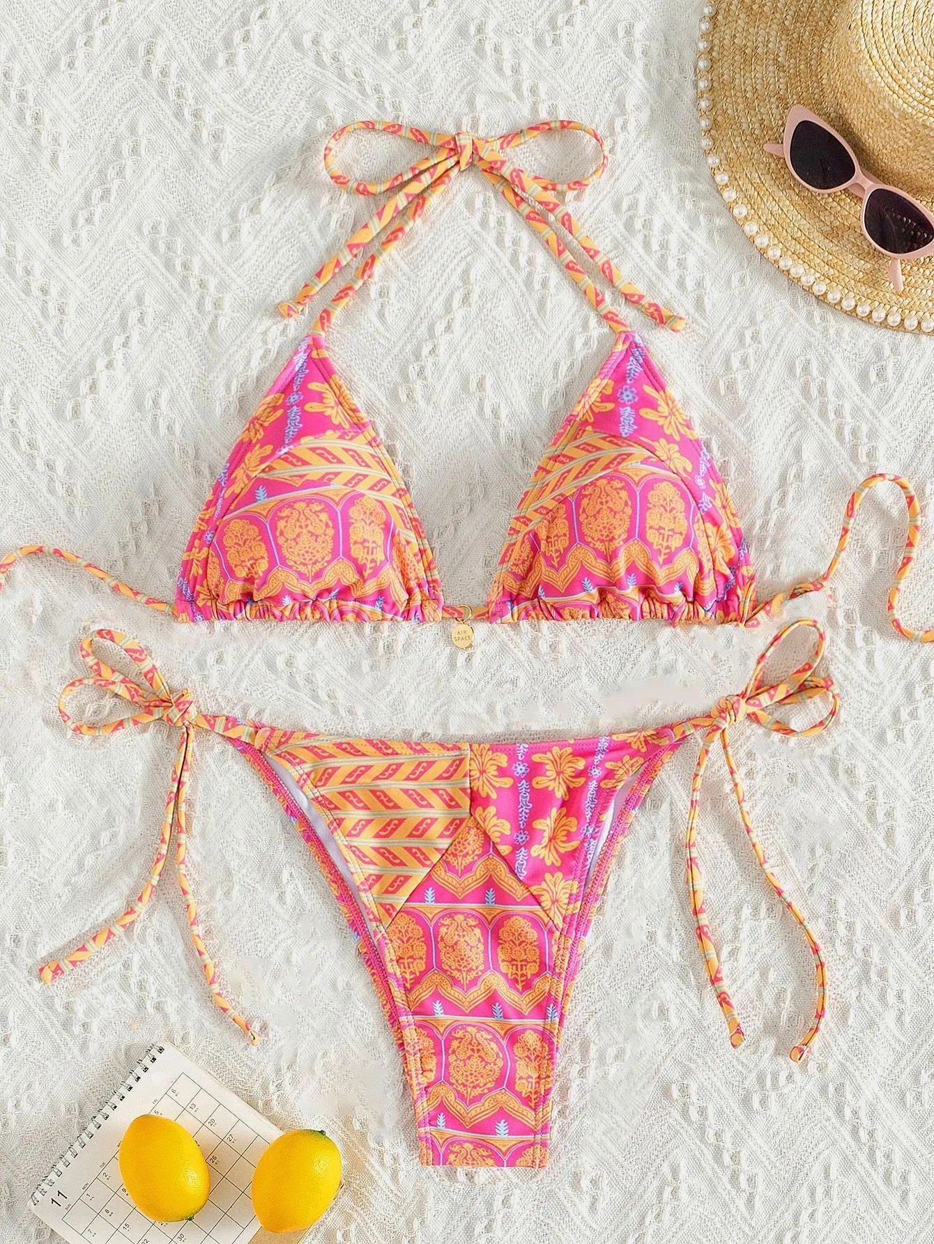 Women's split bikini swimsuit with stitching bandage design in polyester fabric
