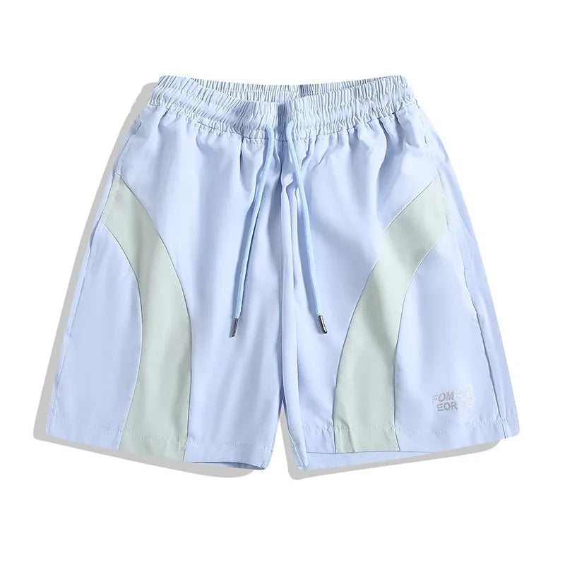 Loose-fit black sports shorts with elastic waistband and straight-leg design for training.