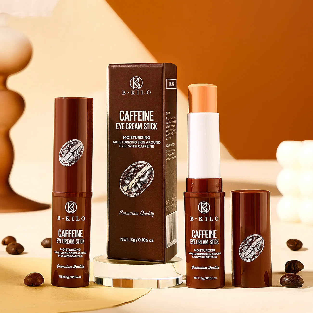 Caffeine eye cream stick in silver and white packaging, 3g net content.
