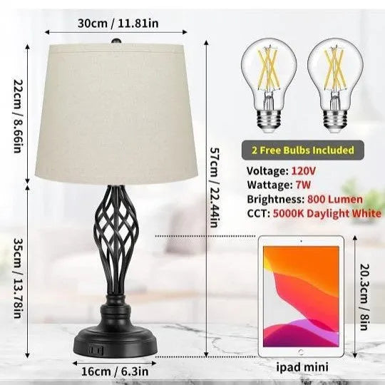 Silver alloy touch control bedside table lamp with USB cable on wooden surface