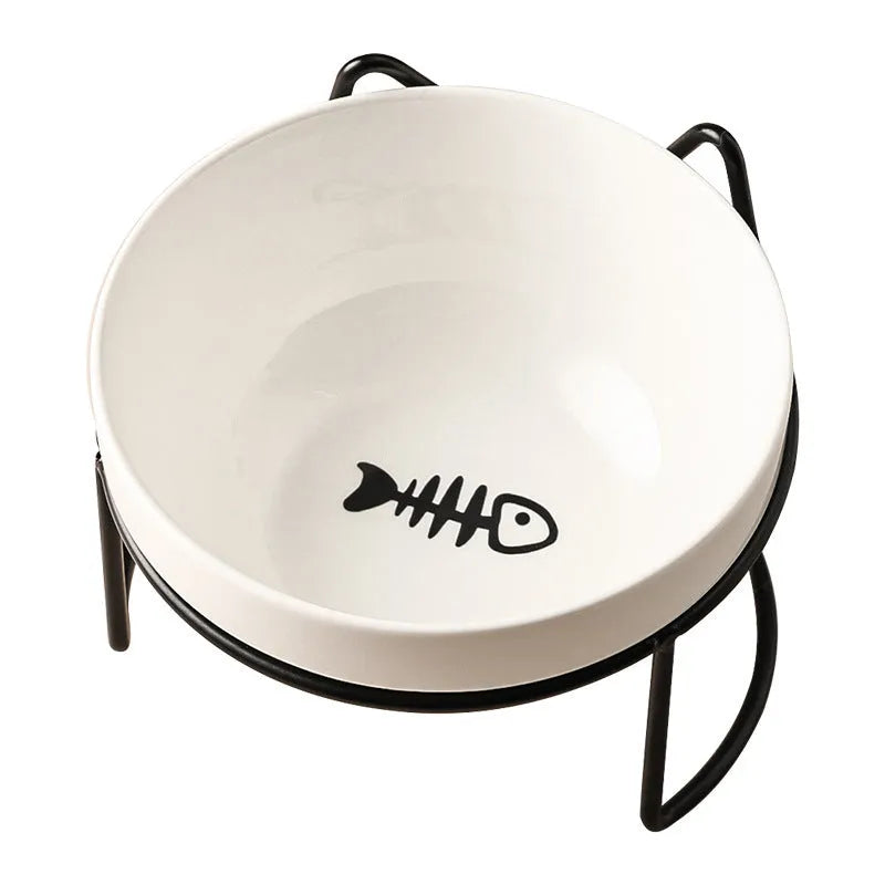 Ceramic cat bowl with iron frame stand showing cat paw print pattern and gold metal finish