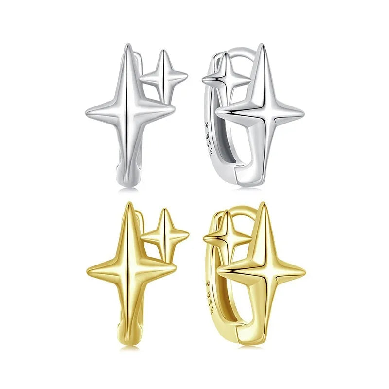 Minimalist star design ear clips in sterling silver with oxidised finish and XINGX elements