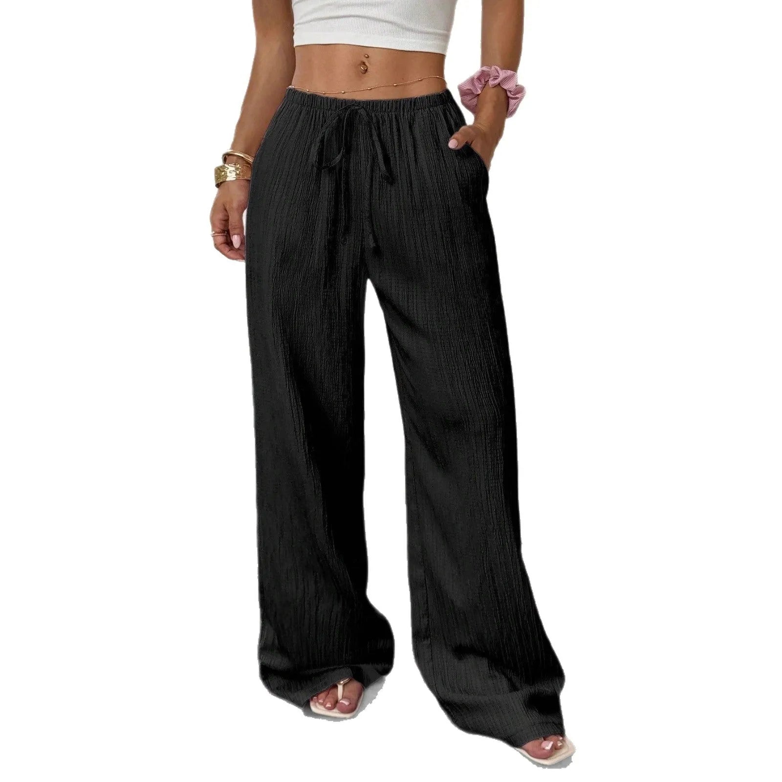 Women's wide-leg black trousers with a lace-up detail on the mid-rise waistband.