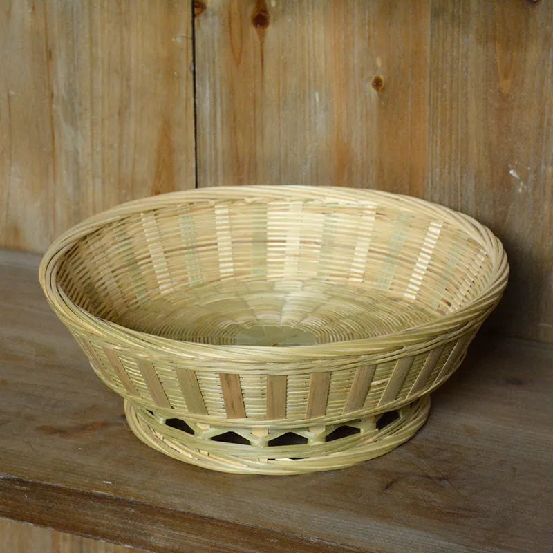 Handmade woven bamboo storage basket in natural colour with open top design