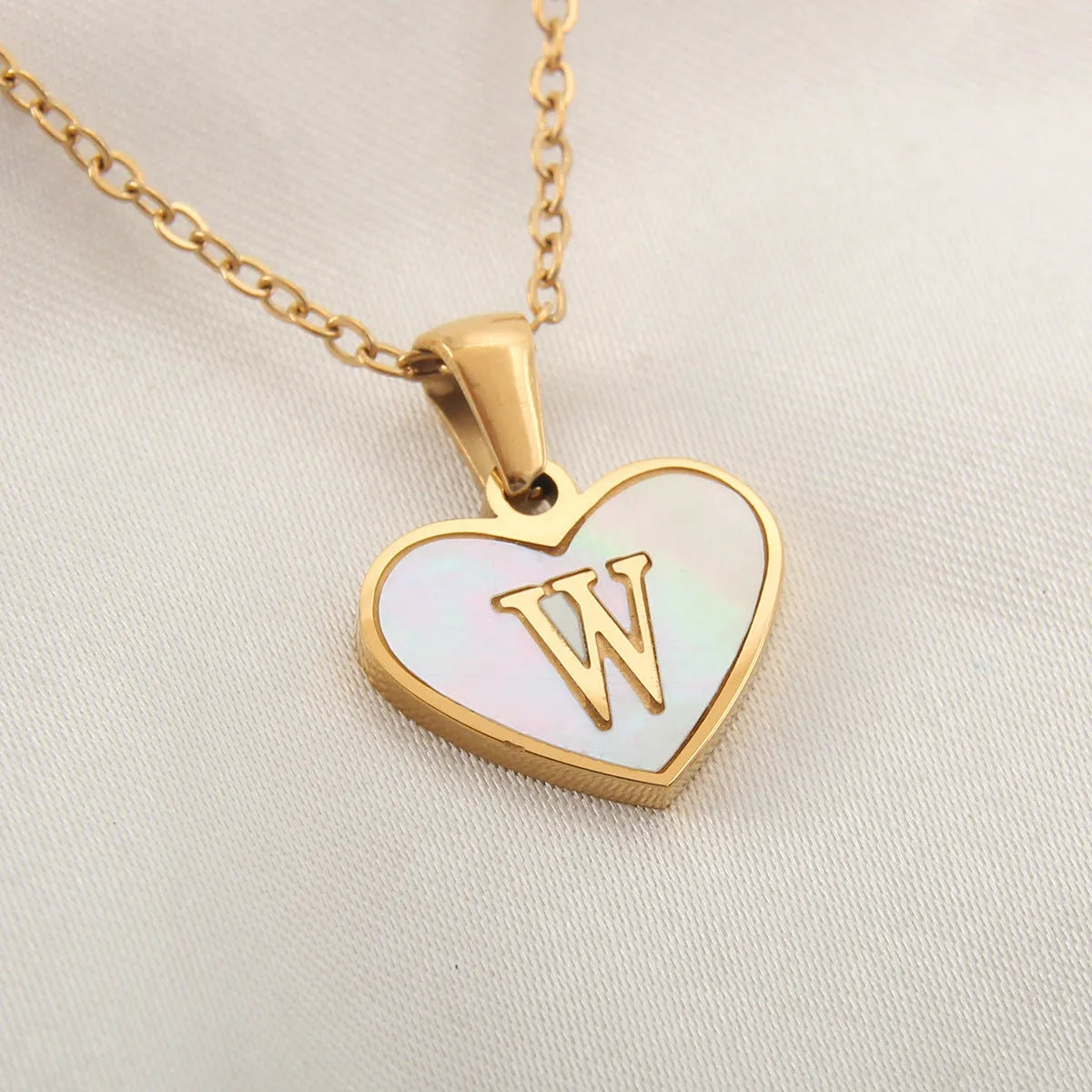 Gold plated personalised heart necklace with white shell on a 45cm chain