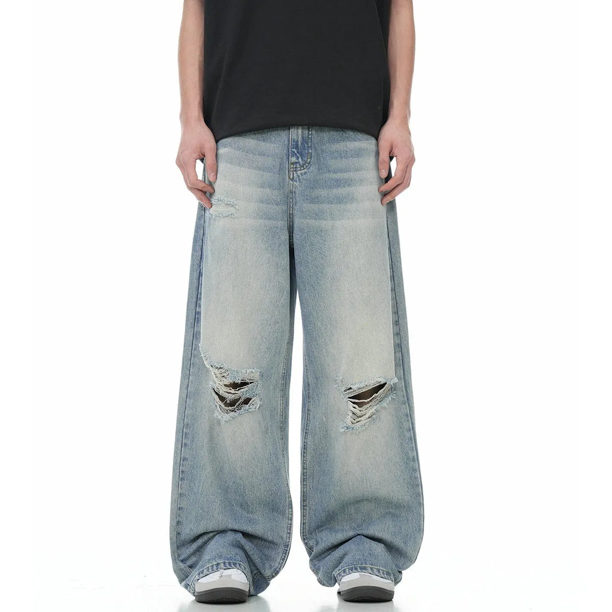 Men's blue straight-leg jeans with ripped details and zipper fly in retro style