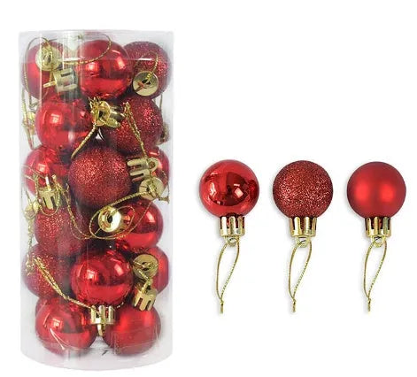 Shiny matte gold, red, silver, and blue 3 cm Christmas baubles spilling from a cardboard box.