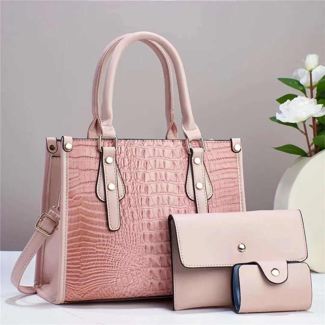 Contrast colour three-piece PU bag set showing crossbody bag, wallet, and card holder in burgundy.