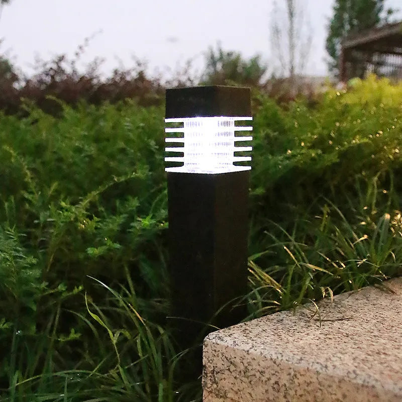 White cuboid solar lawn ground lamp for garden lighting, measuring 60mm by 390mm.