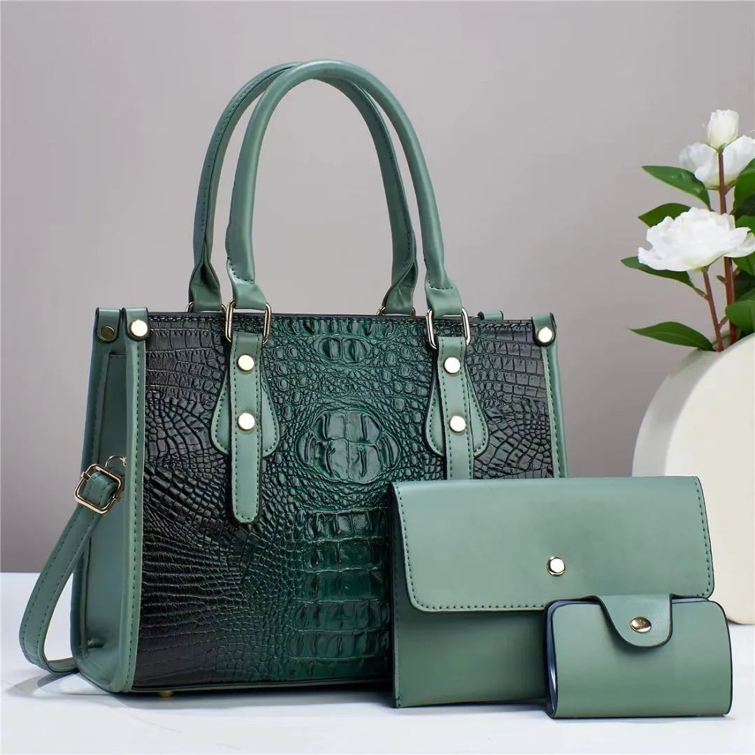 Contrast colour three-piece PU bag set showing crossbody bag, wallet, and card holder in burgundy.