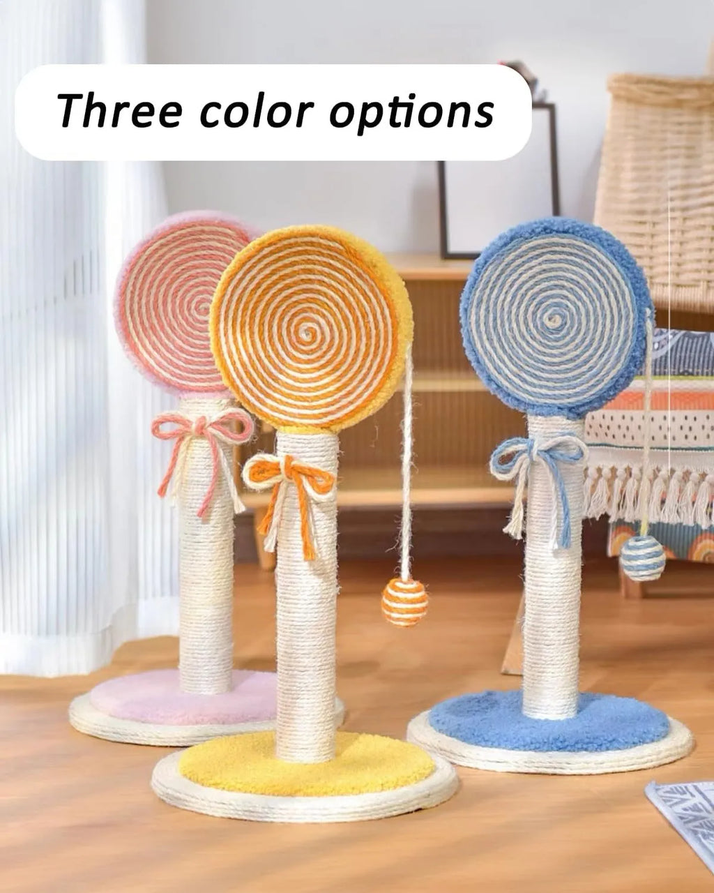 Blue cat scratching post with natural sisal rope and hanging ball toy on sturdy base