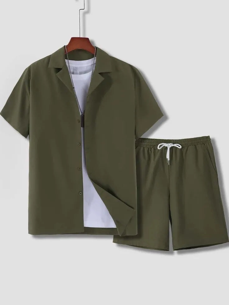 Man wearing a white Cuban collar short sleeve shirt and matching shorts from a men's sport suit set.
