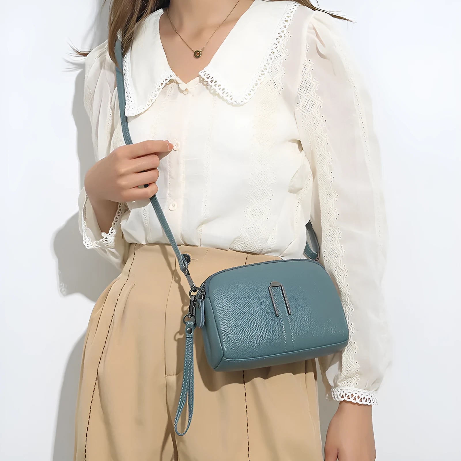 Women's genuine leather shoulder bag in square design measuring 19x13x6cm available in five colours