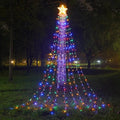 LED five-pointed star waterfall light for outdoor courtyard decoration, 1000mm length, warm white light, on a wooden fence