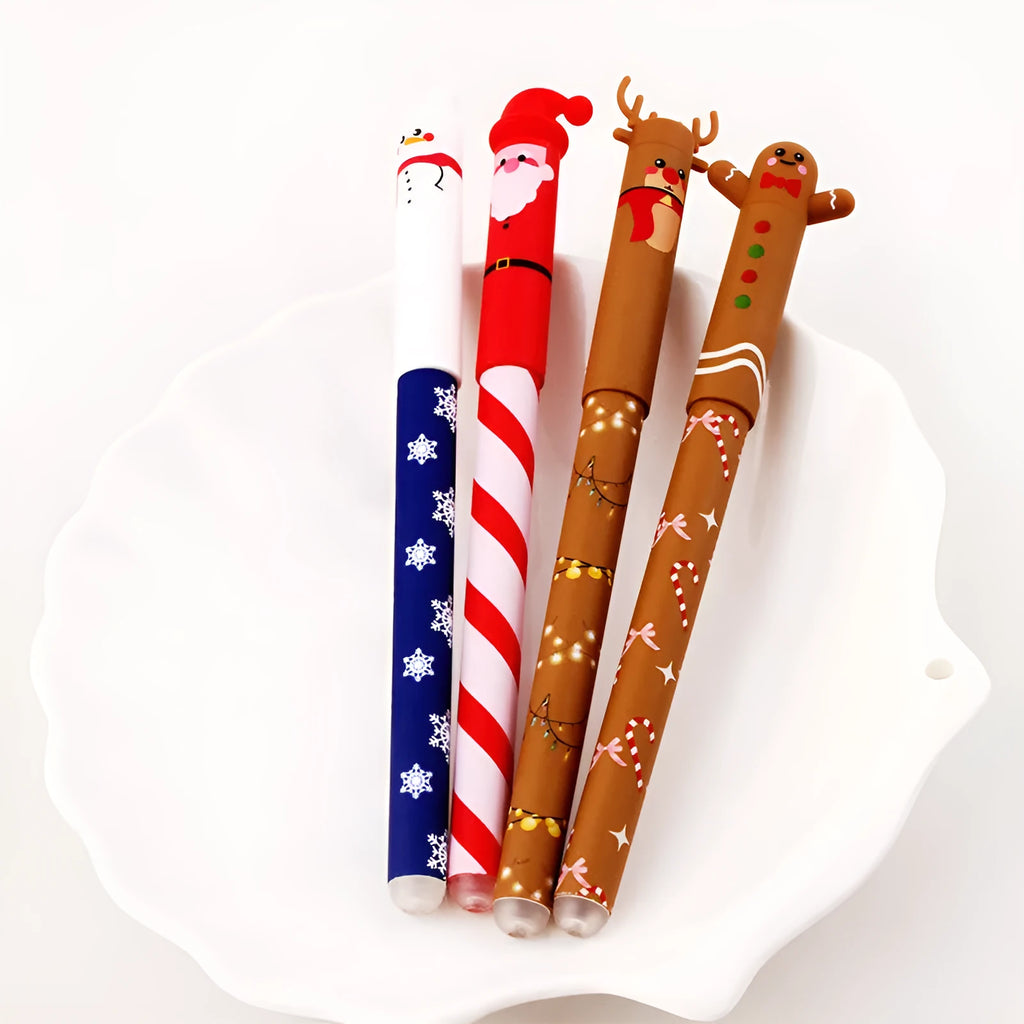 Four erasable gel pens in red, black, green, and blue with Christmas themes on a white background