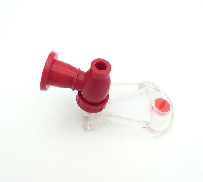Red plastic Magic Tap soda bottle dispenser attached to an inverted 2-litre bottle.