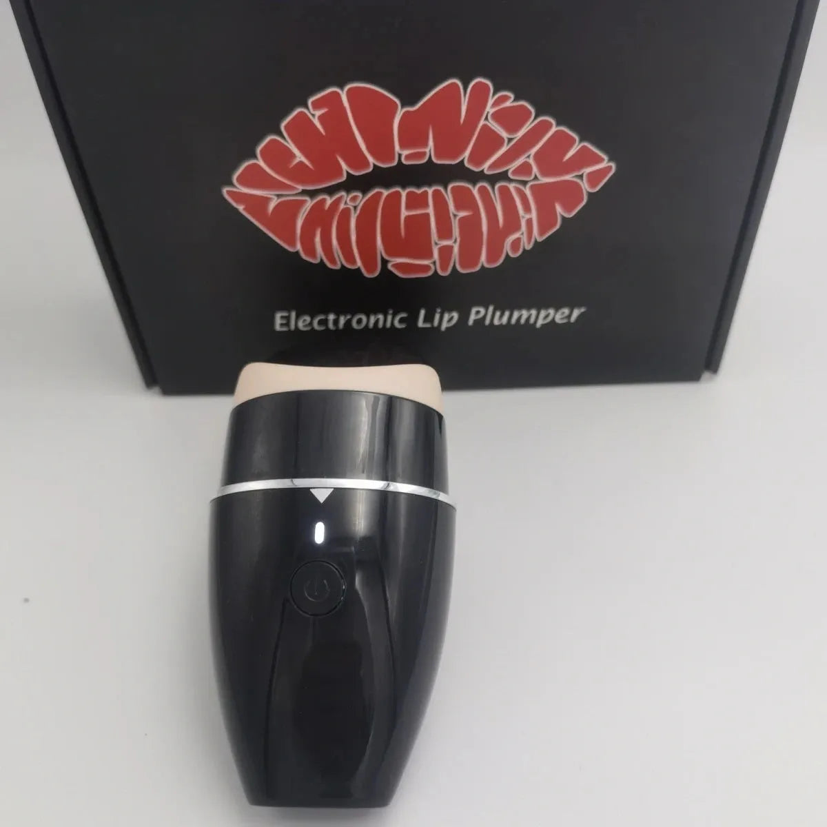 Black and white electric silicone lip plumper with USB charging cable