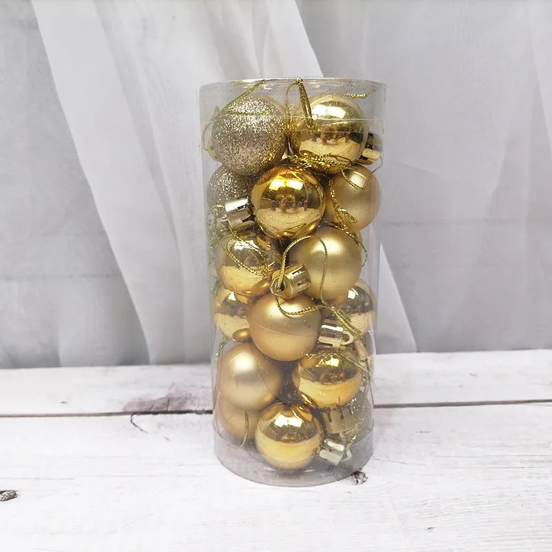 Shiny matte gold, red, silver, and blue 3 cm Christmas baubles spilling from a cardboard box.