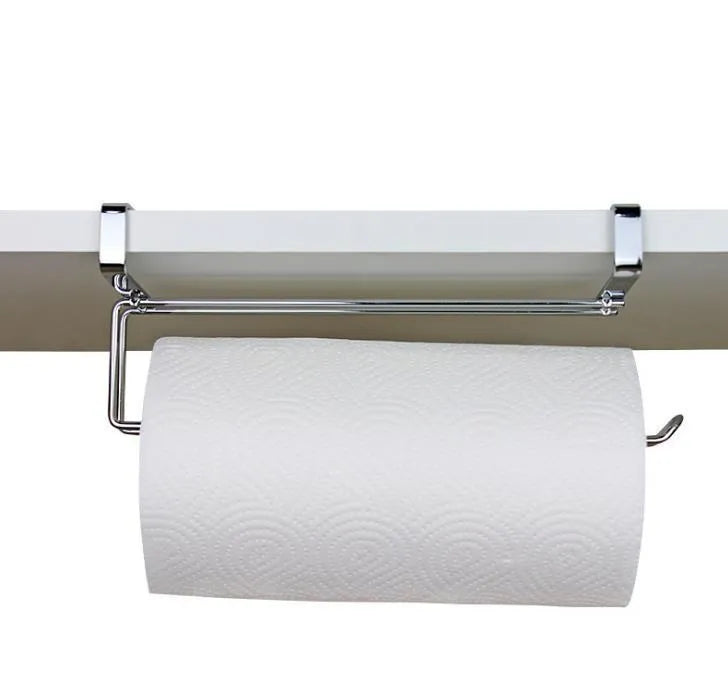 Silver stainless steel paper towel rack mounted on kitchen cabinet door back