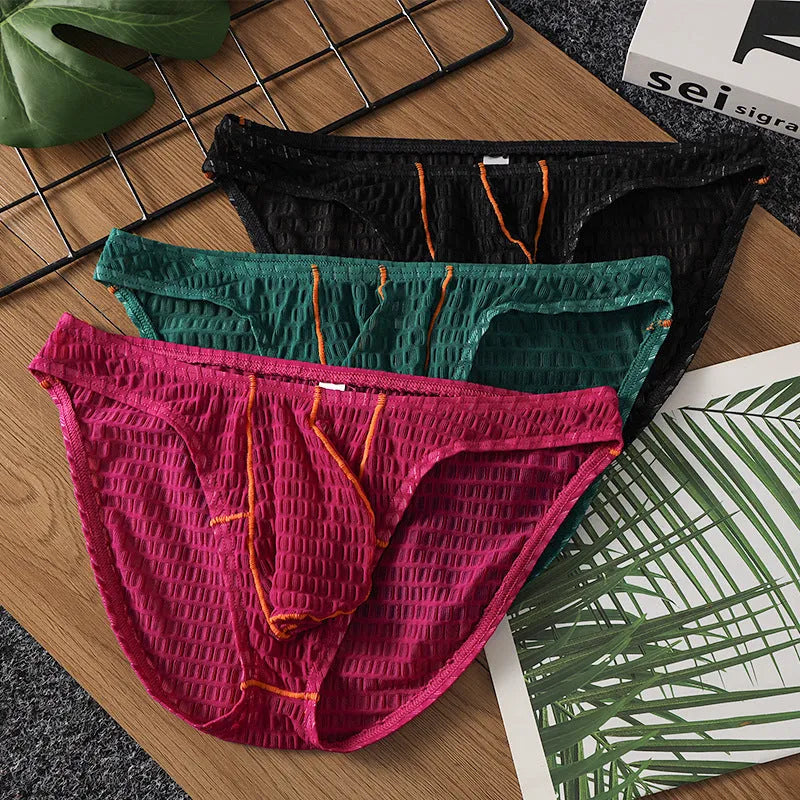 Men's ice silk lace low waist briefs in solid colours on a white background