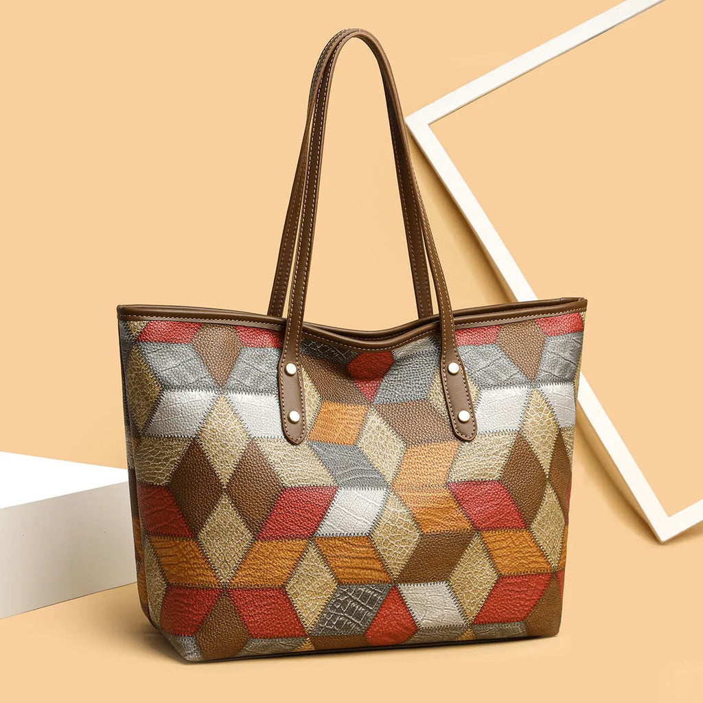 Women's large capacity PVC shoulder bag in blue brown colour with sandwich pocket design