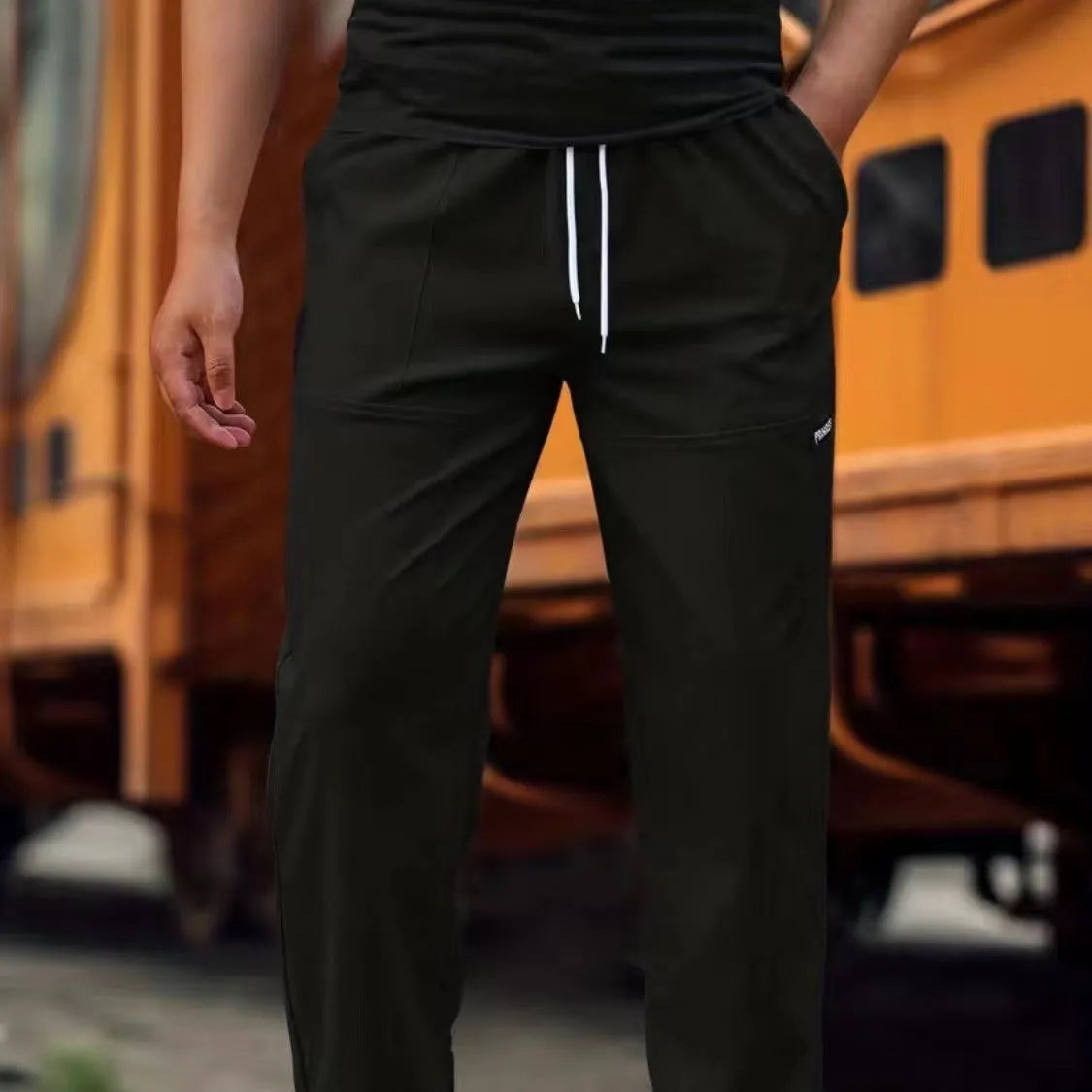Men's polyester trousers in multiple colours including light grey, dark green, black for spring and autumn wear