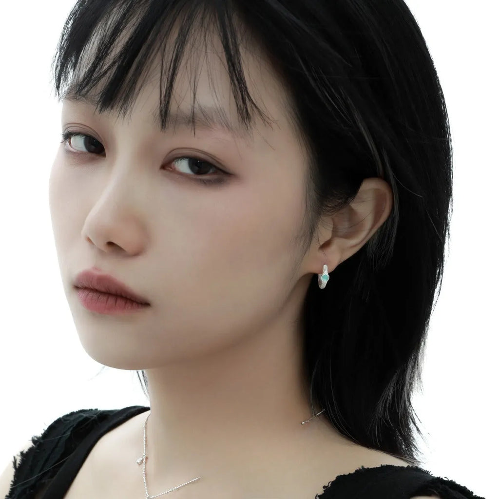 925 sterling silver geometric ear clip with burnt silver electroplated finish and round elements