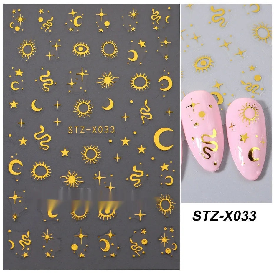 Plastic sheet of black, silver, and cartoon design nail art stickers for DIY manicures.