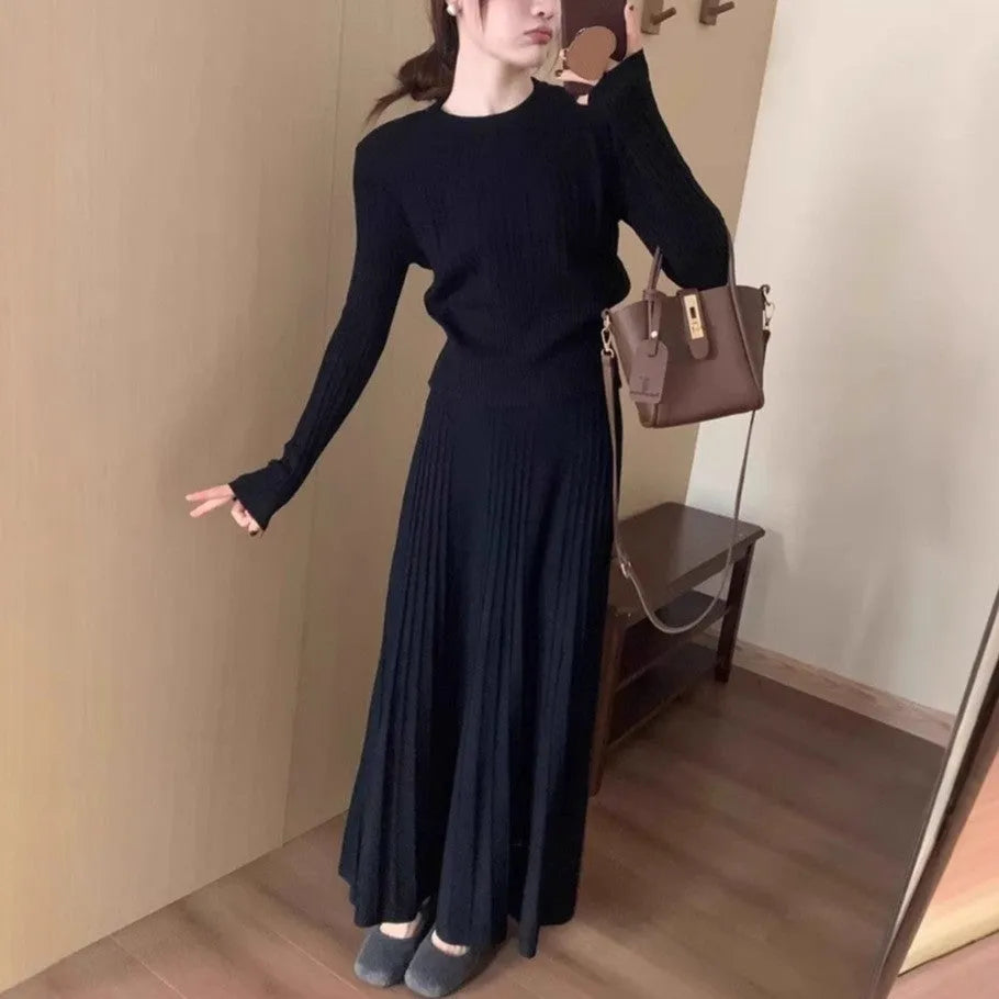 Dark grey knitted long dress suit with artistic retro 3D pattern, showing sweater and skirt.