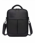 Black oxford fabric men's messenger bag with shoulder strap and carry handle.