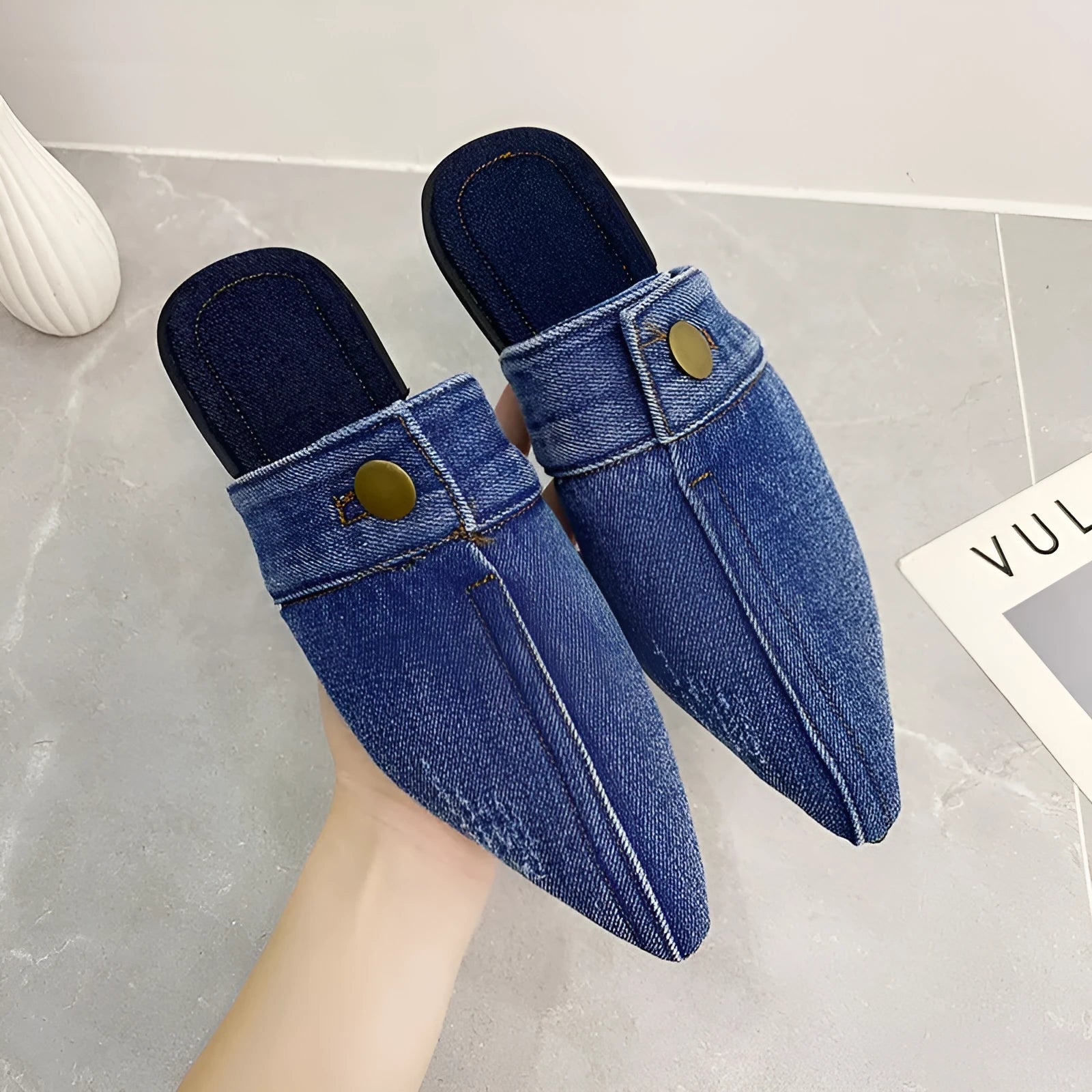 Women's washed denim flat closed toe slippers in light blue with canvas upper and rubber sole