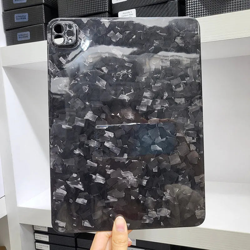 Carbon fibre hard protective case for Apple iPad Pro 11 showing embossed plaid pattern and choice of surface finishes.
