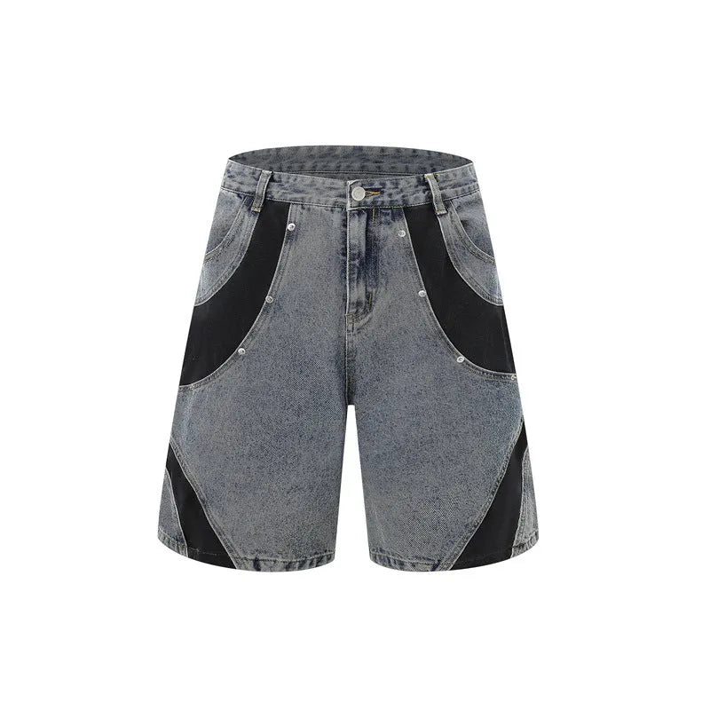 Retro washed blue denim short-sleeve jacket and matching trousers suit laid flat.