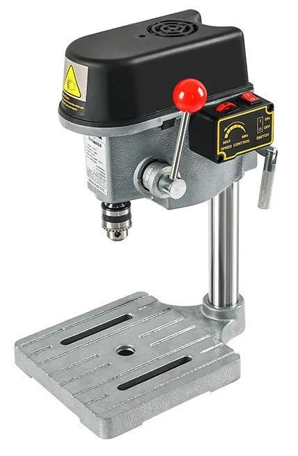 Mini bench drill milling machine with cross bench pliers on workbench