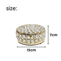 French gold metal frame jewellery box with transparent crystal glass panels displaying contents
