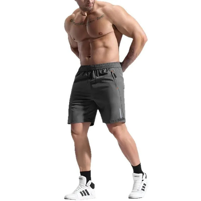 Men's grey bamboo fibre elastic waist sports shorts with a drawstring on a plain background