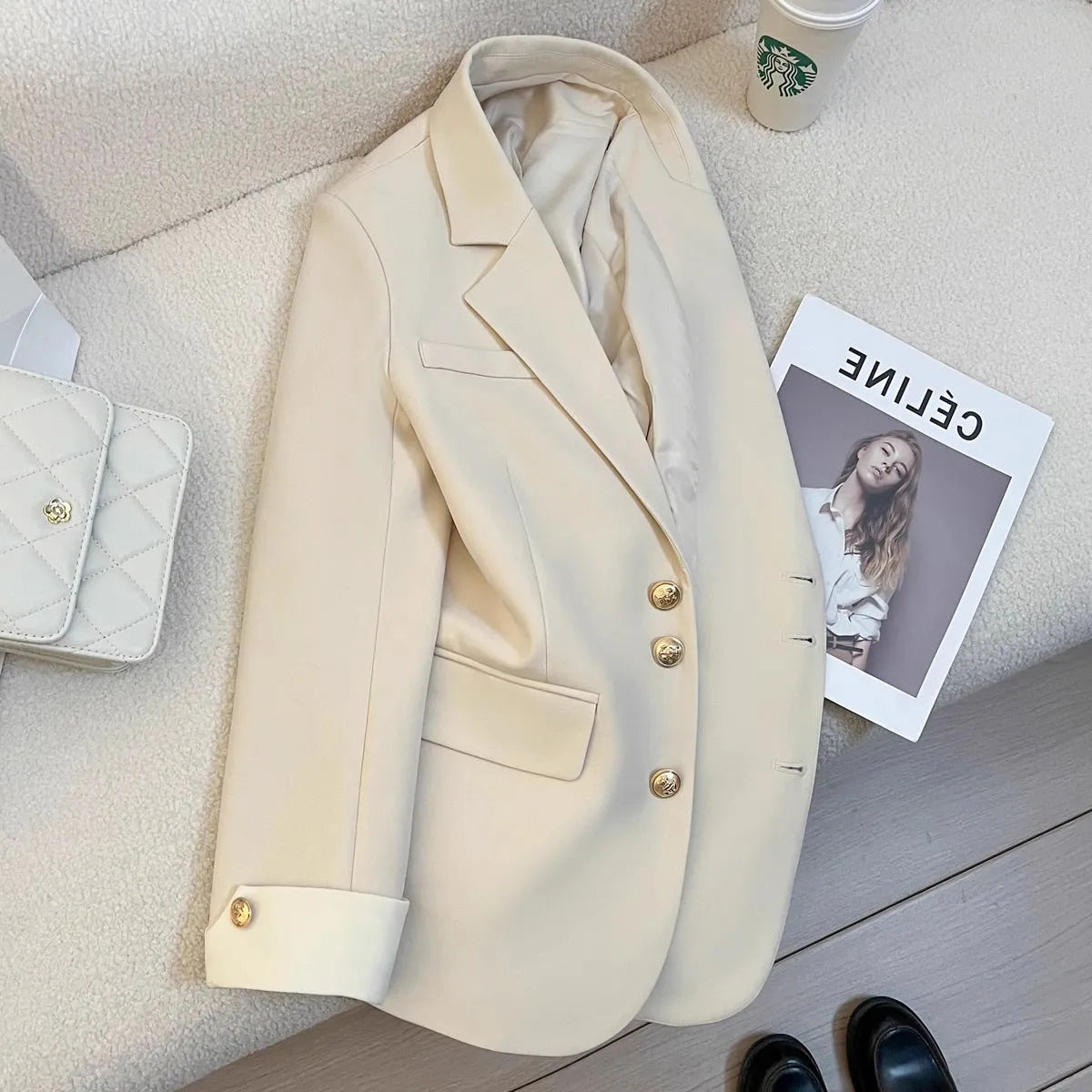 Beige Korean-style loose fit mid-length women's coat with long sleeves and pockets.