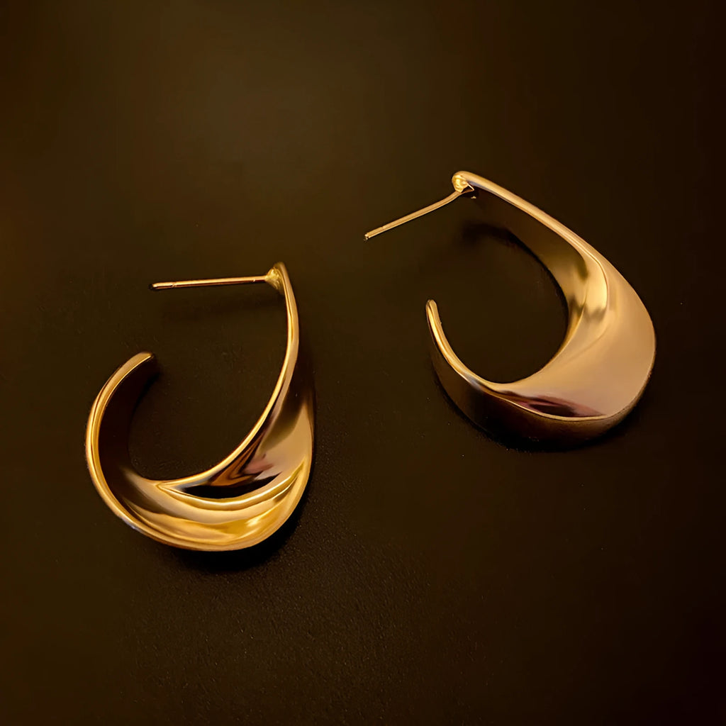 Geometric twisted metal earrings in gold or silver electroplated finish