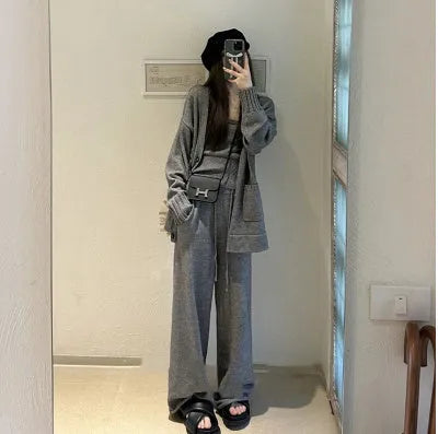 Women's loose fit wool blend cardigan three-piece set in beige, showing vest, coat, and casual pants.