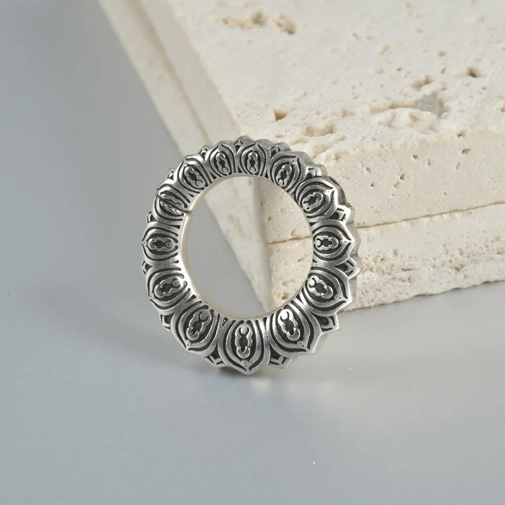 Retro heart-shaped hollow lotus magnetic earrings in stainless steel with antique silver finish