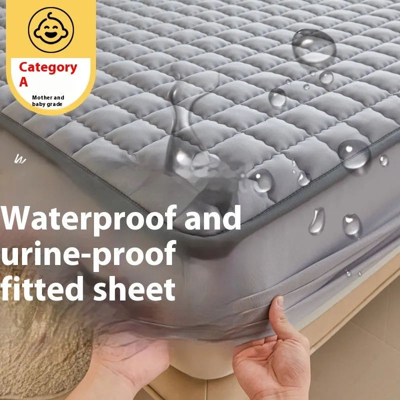 Washed cotton waterproof fitted sheet in light grey colour with elasticated corners on a mattress